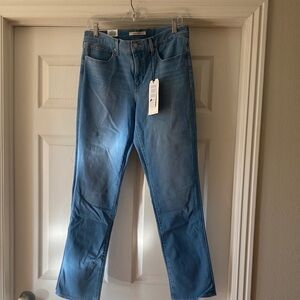 Levi's Women’s 312 Shaping Slim Light Blue Jeans Sz 31/32.  NWT